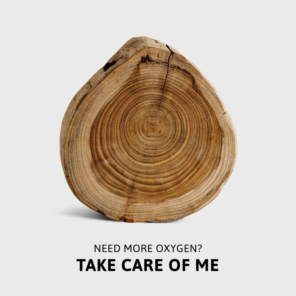 Immagine di un tronco con la scritta "nne more oxygen?
Take care of me"